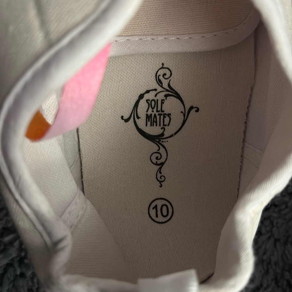 NWOT size 10 white pair of shoes with colorful laces. - Picture 2 of 3